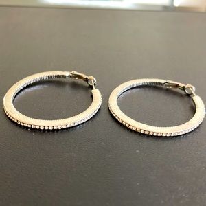 Large hoops silver earings from Guess with immitation diamonds